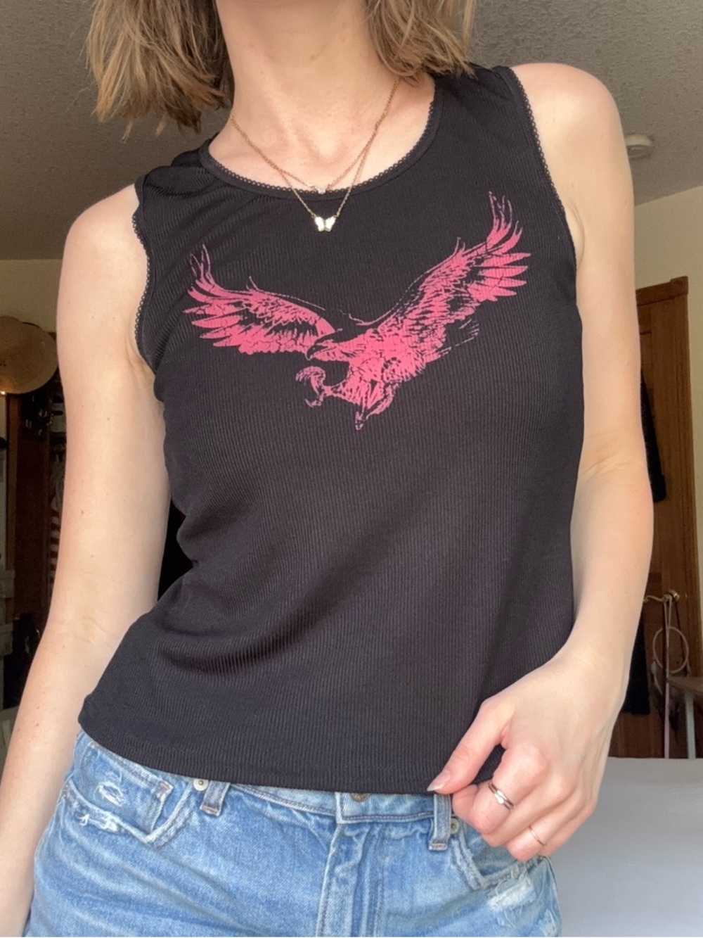 prettylittlething black and hot pink eagle graphic crewneck tank top